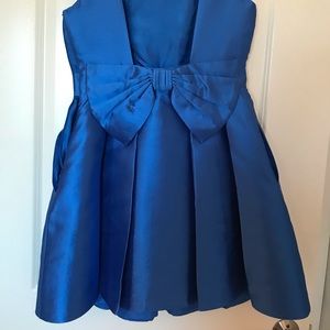 Open back. Worn once.